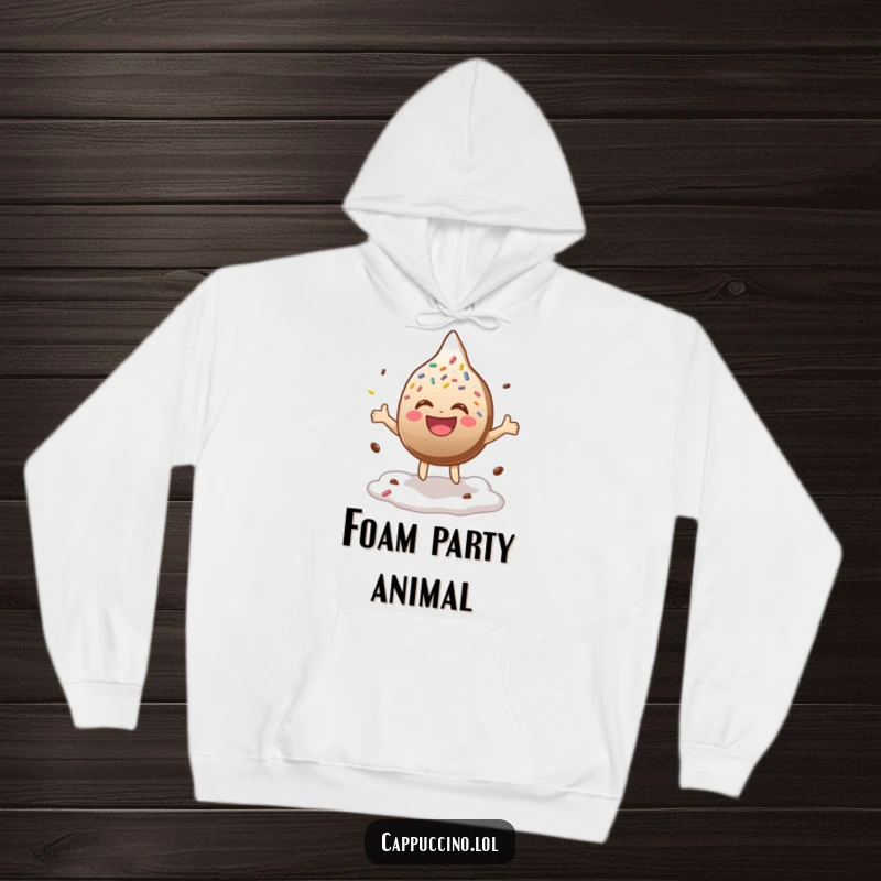 Funny Hoodie showing a laughing chocolate sprinkle character joyfully bouncing on creamy coffee foam, cozy and cheerful.